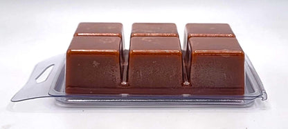 Side view of Reindeer Poo Soy Wax Melt cubes with holiday fragrance notes