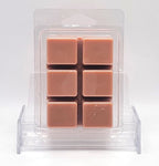 Close-up of 2.5oz Sandalwood Wax Melt with warm, amber glow