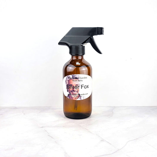 A mist of room spray filling the air with rich, masculine fragrance
