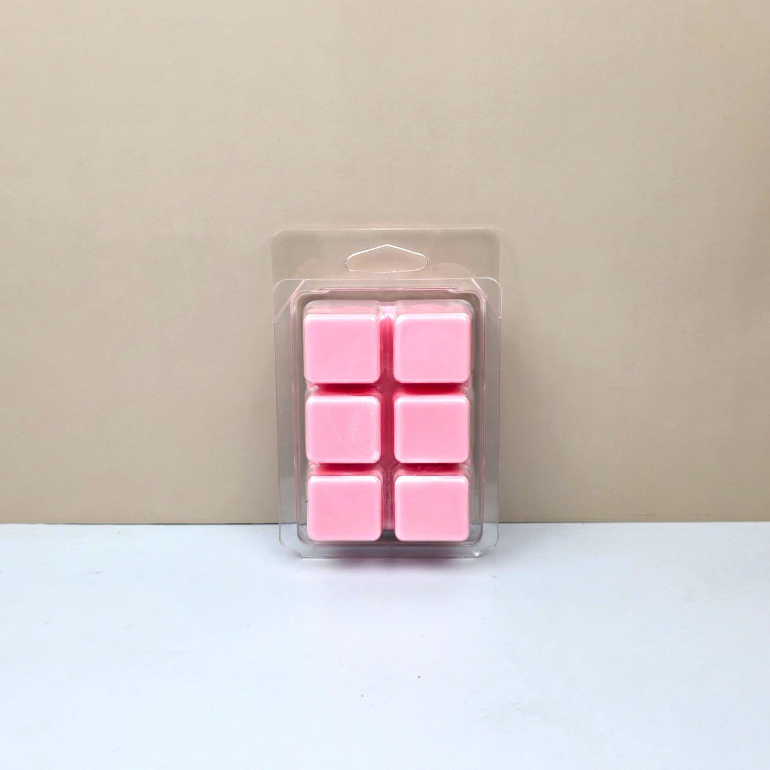 Warm terracotta-toned luxury label for Solstice modern home fragrance.