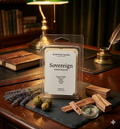 Sovereign Refined Masculine luxury wax melt by Smell Good Candles, featuring notes of Bergamot, Marine, Lavender, and Cedar, styled in a vintage mahogany study with a green banker’s lamp and raw cedar wood.