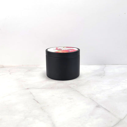 Strawberries & Cream 4oz Soy Candle in black candle tin with hand-poured pink soy wax