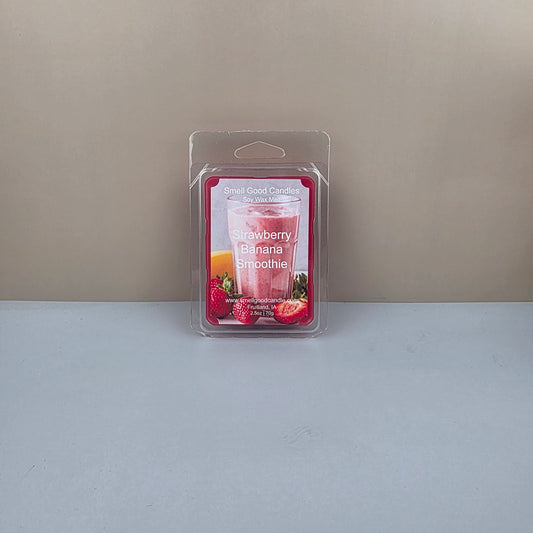 Packaged strawberry banana smoothie flavor wax melt on a neutral background