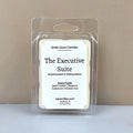 The Executive Suite wax melt by Smell Good Candles, a sophisticated masculine fragrance with notes of Italian Leather, Bergamot, Cedarwood, and Smoked Oud.