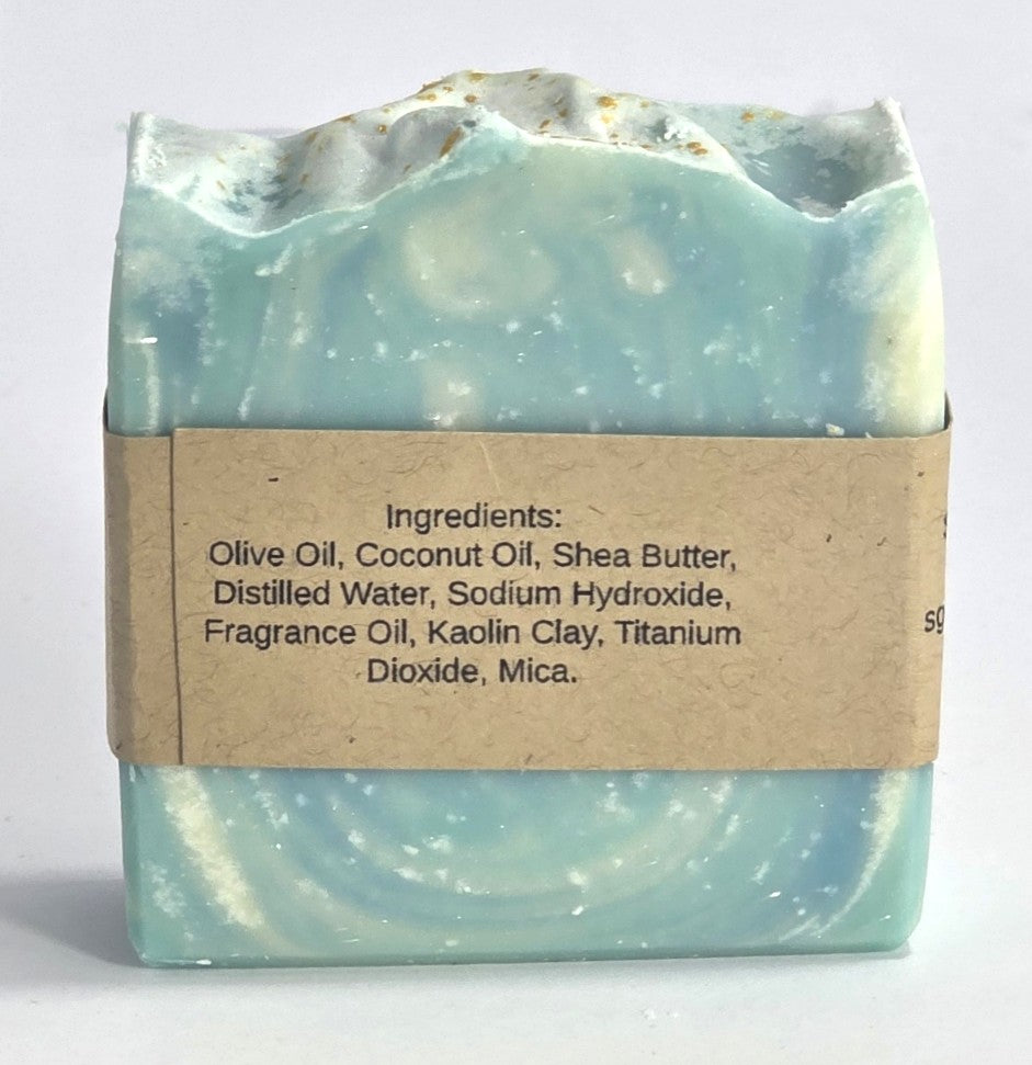 Ingredient list label on the back of a handmade The Perfect Man artisan soap bar featuring nourishing olive oil, shea butter, and coconut oil.