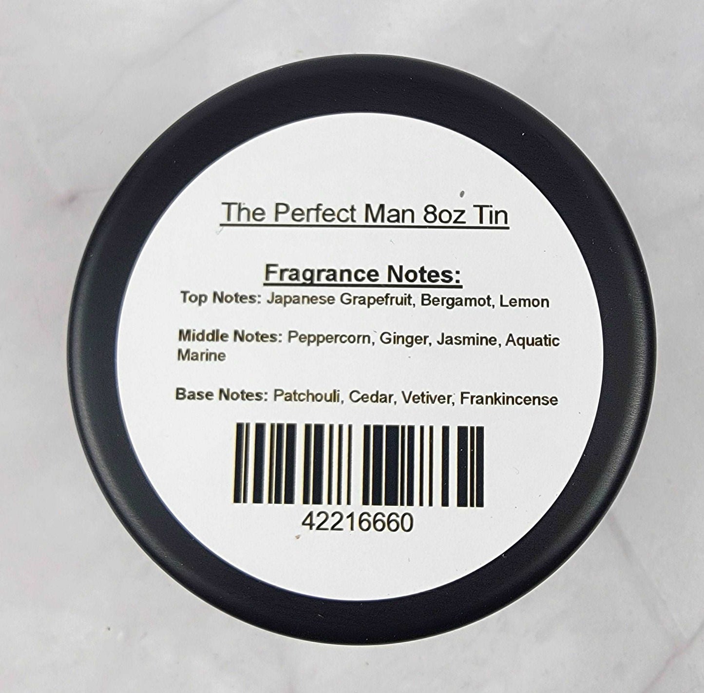 Hand-poured 8oz soy candle with notes of citrus, spice, and rich woods