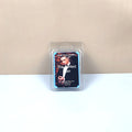 Packaged candle labeled 'The Perfect Man' on a beige background