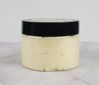 Bright citrus and amber-scented whipped body lotion for soft, glowing skin
