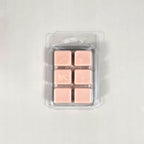 Clear 6-cavity clamshell packaging featuring off-white, hand-poured soy wax melt cubes for home fragrance warmers.