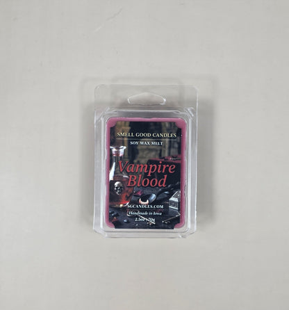 Soy wax melt package labeled 'Vampire Blood' by Smell Good Candles on a gray background