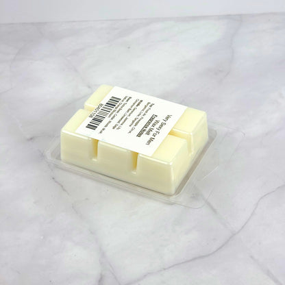 Eco-friendly soy wax melt with invigorating top notes of pineapple, lime, and bergamot, and a masculine base of musk, vetiver, and tonka bean, perfect for setting a sensual mood.