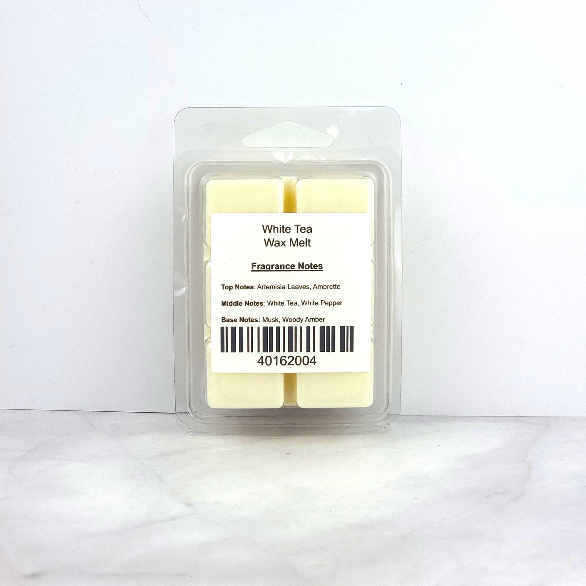 Hand-poured 2.5oz White Tea Soy Wax Melt inspired by Bvlgari for a luxurious, unisex fragrance with musk and woody amber.