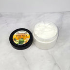 Handmade White Tea & Ginger Body Lotion with floral petals, ginger, and soft musk, inspired by Bath & Body Works’ revitalizing fragrance.