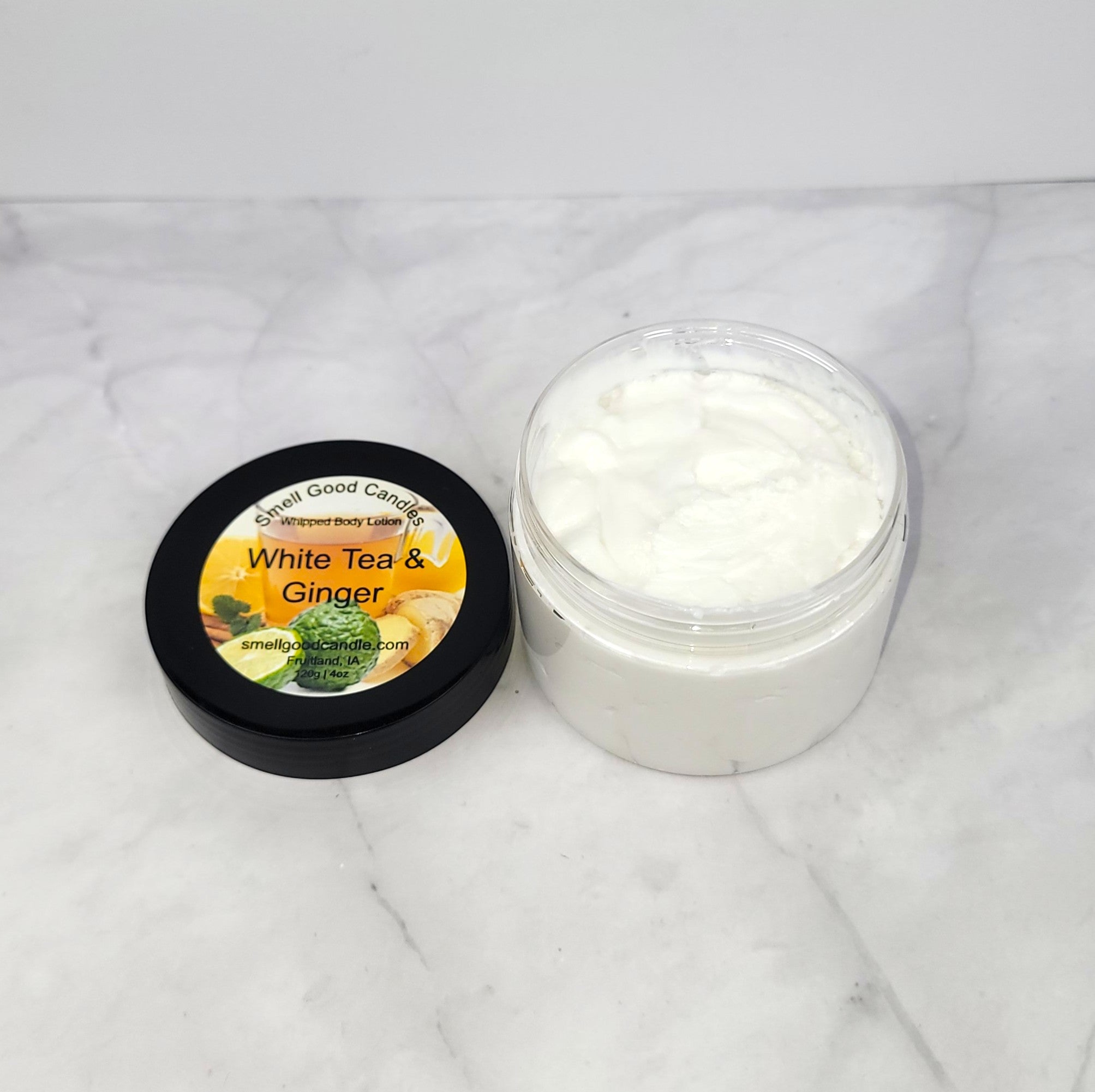 Handmade White Tea & Ginger Body Lotion with floral petals, ginger, and soft musk, inspired by Bath & Body Works’ revitalizing fragrance.