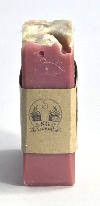 Smell Good Candles brand logo printed on the side paper band of a small-batch artisan soap bar.