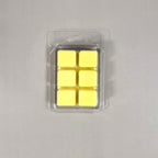Clear 6-cavity clamshell packaging showcasing cream-colored, hand-poured soy wax melt cubes for home fragrance.