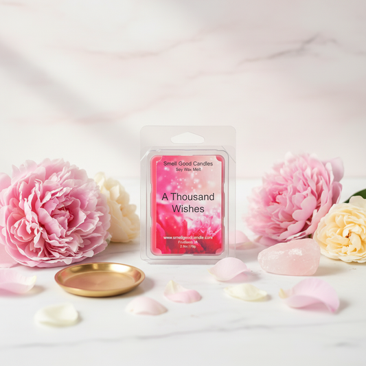 A Thousand Wishes Soy Wax Melt with floral, fruity, amber, and sandalwood fragrance displayed in an elegant decorative setting
