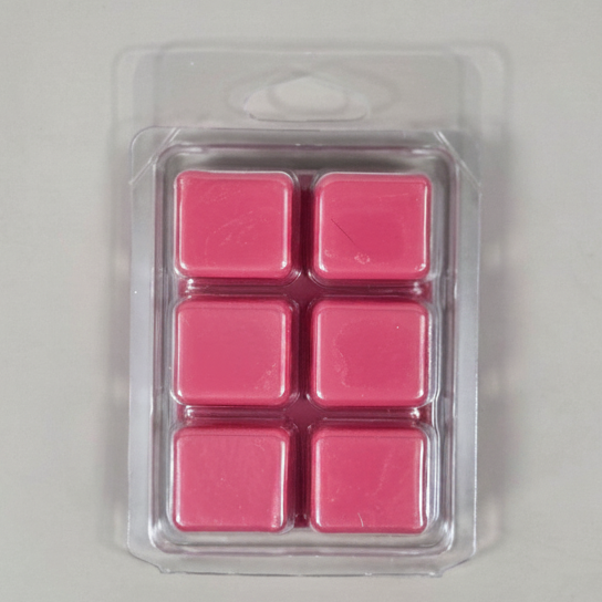 Strawberries and Cream Soy Wax Melt cubes in hand-poured pink soy wax clamshell packagin