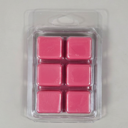Strawberries and Cream Soy Wax Melt cubes in hand-poured pink soy wax clamshell packagin
